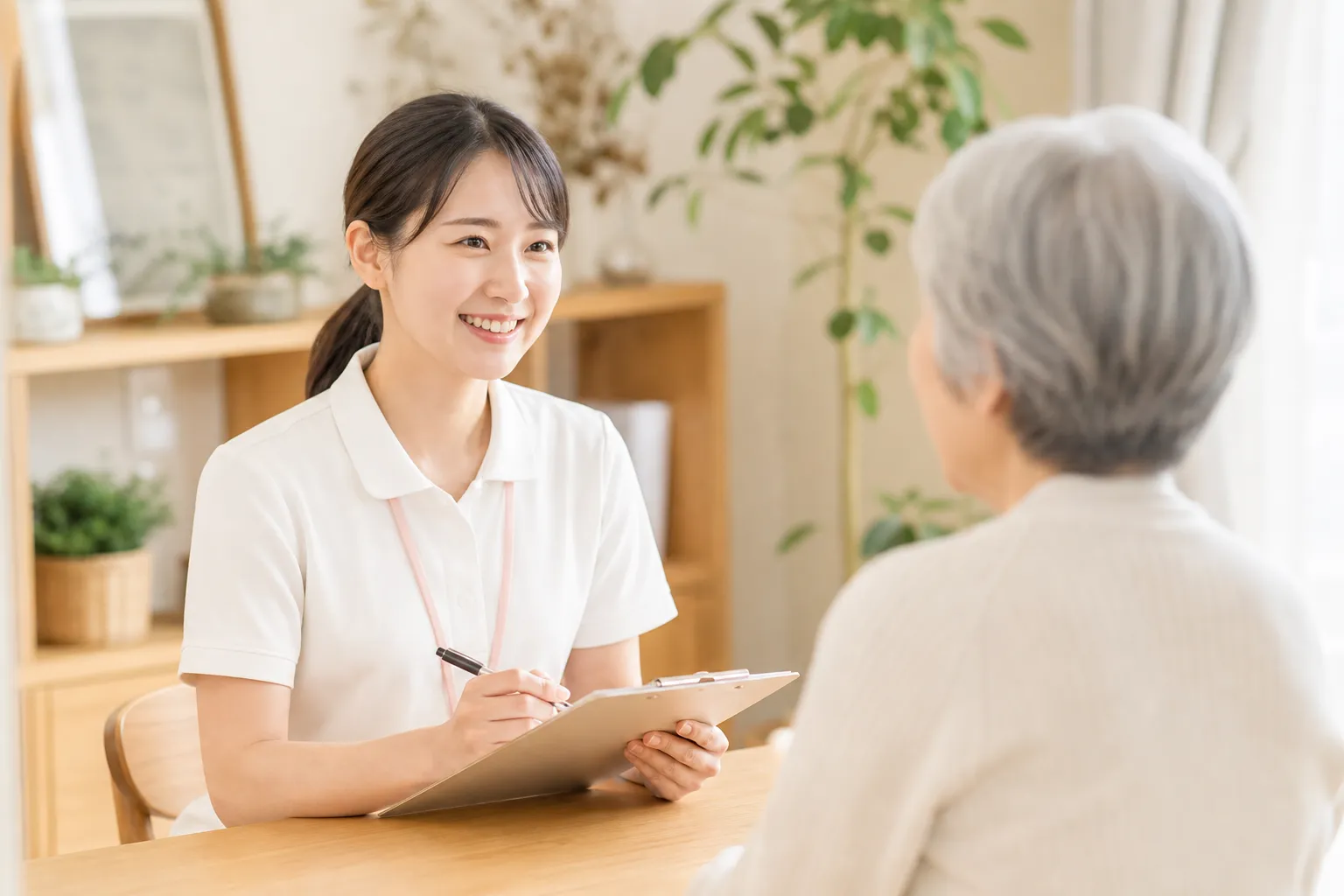 Nurse listening to a consultation